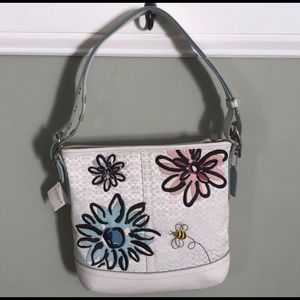 White coach purse with coach cs